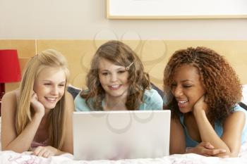 Royalty Free Photo of Girls With a Laptop