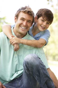 Royalty Free Photo of a Father and Son Outdoors