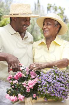 Royalty Free Photo of a Couple With Flowers
