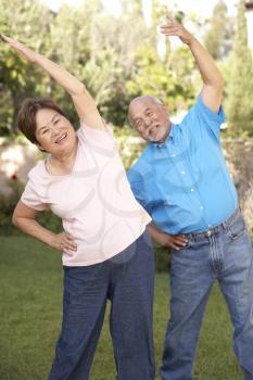 Royalty Free Photo of a Couple Stretching