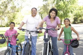 Royalty Free Photo of Grandparents and Children on Bikes