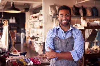 Portrait Of Male Owner Standing In Gift Store