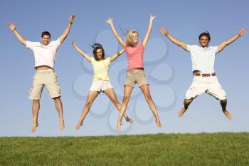 Young couples jumping in air