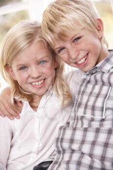 Two young children pose together