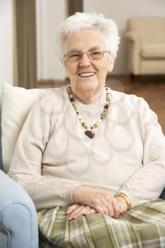 Senior Woman In Chair At Home