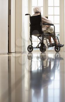 Disabled Senior Woman Sitting In Wheelchair