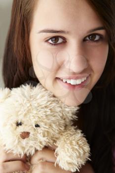 Close up teenage girl with cuddly toy