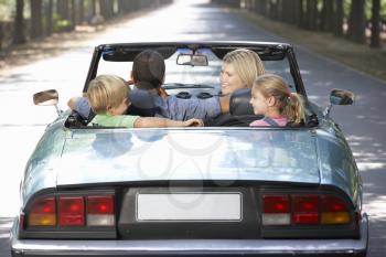 family in sports car