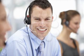 Young businessman wearing headset