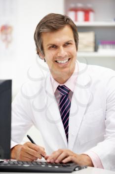 Hospital doctor at desk