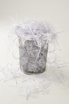 Waste bin full of shredding