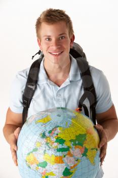 Young traveller with globe