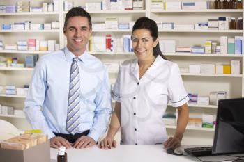 UK nurse and pharmacist working in pharmacy
