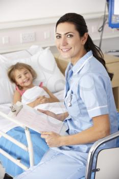 Nurse with child patient in UK Accident and Emergency