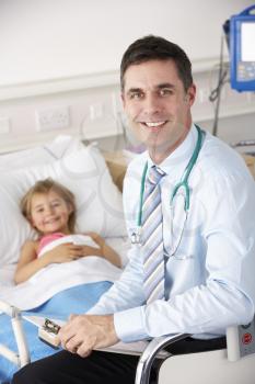 Doctor with child patient in UK Accident and Emergency