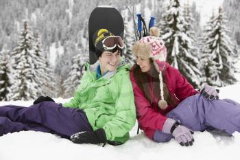 Two Teenagers On Ski Holiday In Mountains