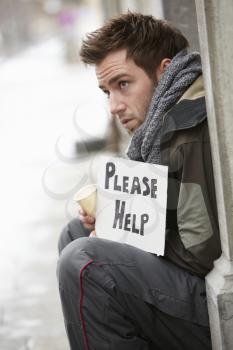 Homeless Young Man Begging In Street