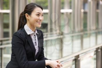 Portrait Of Chinese Businesswoman Outside Office