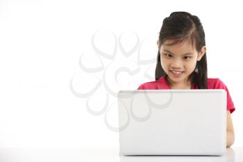 Studio Shot Of Chinese Girl With Laptop