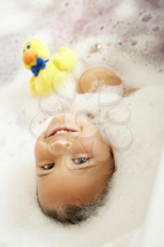 Girl Playing In Bath