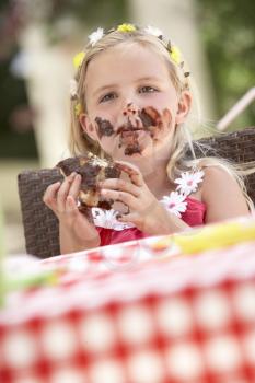 Messy Girl Eating Chocolate Cake