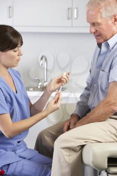 Doctor Giving Male Patient Injection