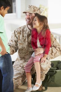 Children Greeting Military Father Home On Leave