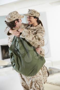 Military Couple Greeting Each Other On Home Leave