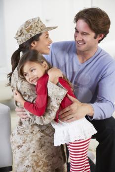 Family Greeting Military Mother Home On Leave
