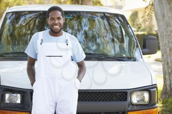 Portrait Of Repairman With Van