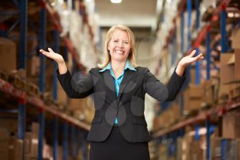 Portrait Of Female Manager In Warehouse