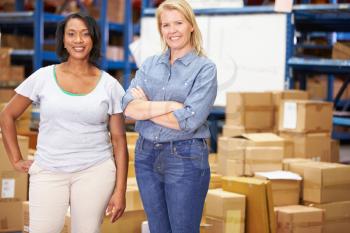 Portrait Of Workers In Distribution Warehouse