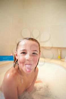Girl In Bath Sticking Out Tongue