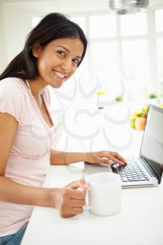 Indian Woman Using Laptop At Home