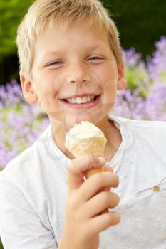 Young Boy Eating Ice Cream Outdoors