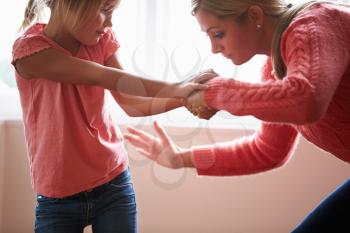 Mother Hitting Young Daughter