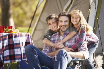 Father And Children Enjoying Camping Holiday In Countryside