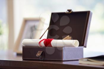 Documents And Letters In Keepsake Box On Desk