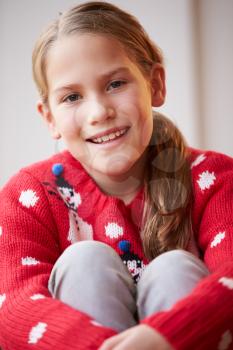 Portrait Of Girl Wearing Christmas Jumper