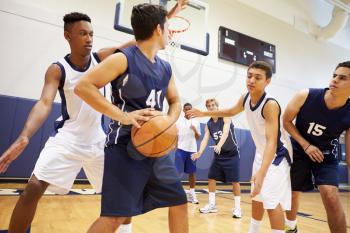 Male High School Basketball Team Playing Game