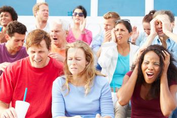 Disappointed Spectators At Outdoor Sports Event