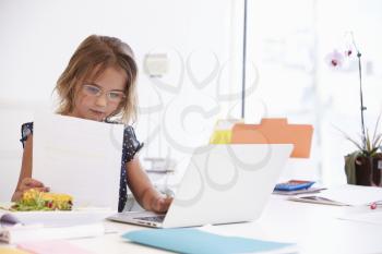 Girl Pretending To Be Businesswoman Working At Desk