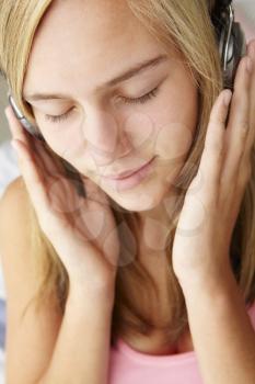 Teenage girl wearing headphones