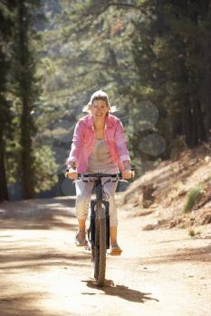 Woman on country bike ride