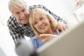 Senior couple using skype