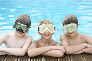 Boys in outdoor swimming pool