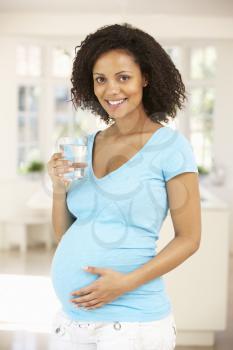 Pregnant woman drinking water