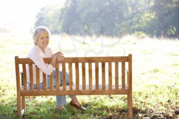 Senior woman sitting outdoors