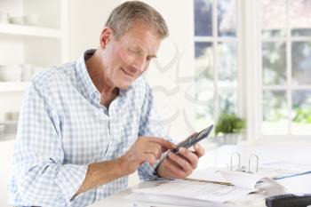 Retired man with household bills