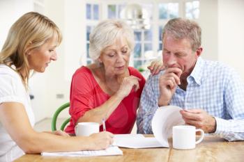Retired couple with financial advisor